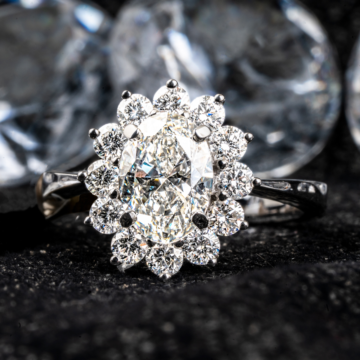 White gold diamond halo engagement ring.