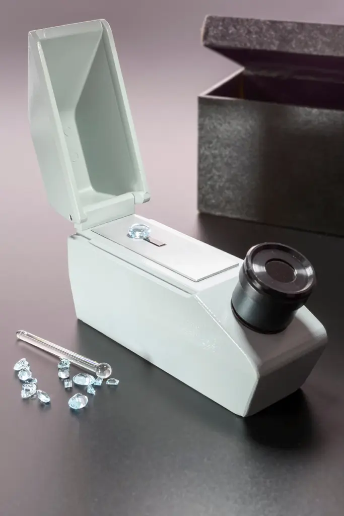 Professional gemstone identification tool used to examine loose diamonds during jewelry appraisal