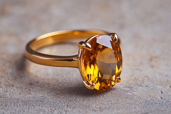 a close up image of a topaz ring